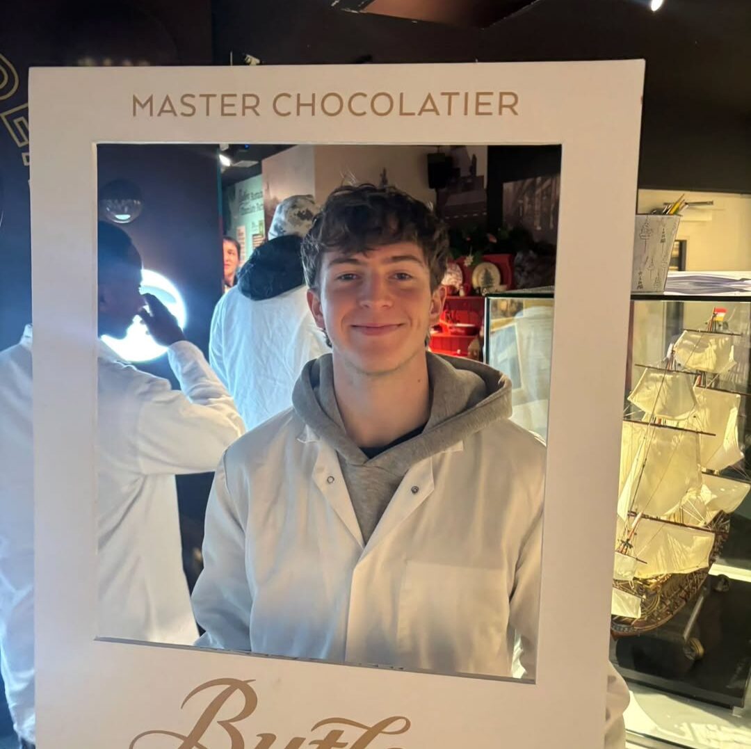 Business students participating in hands-on learning during an enterprise visit