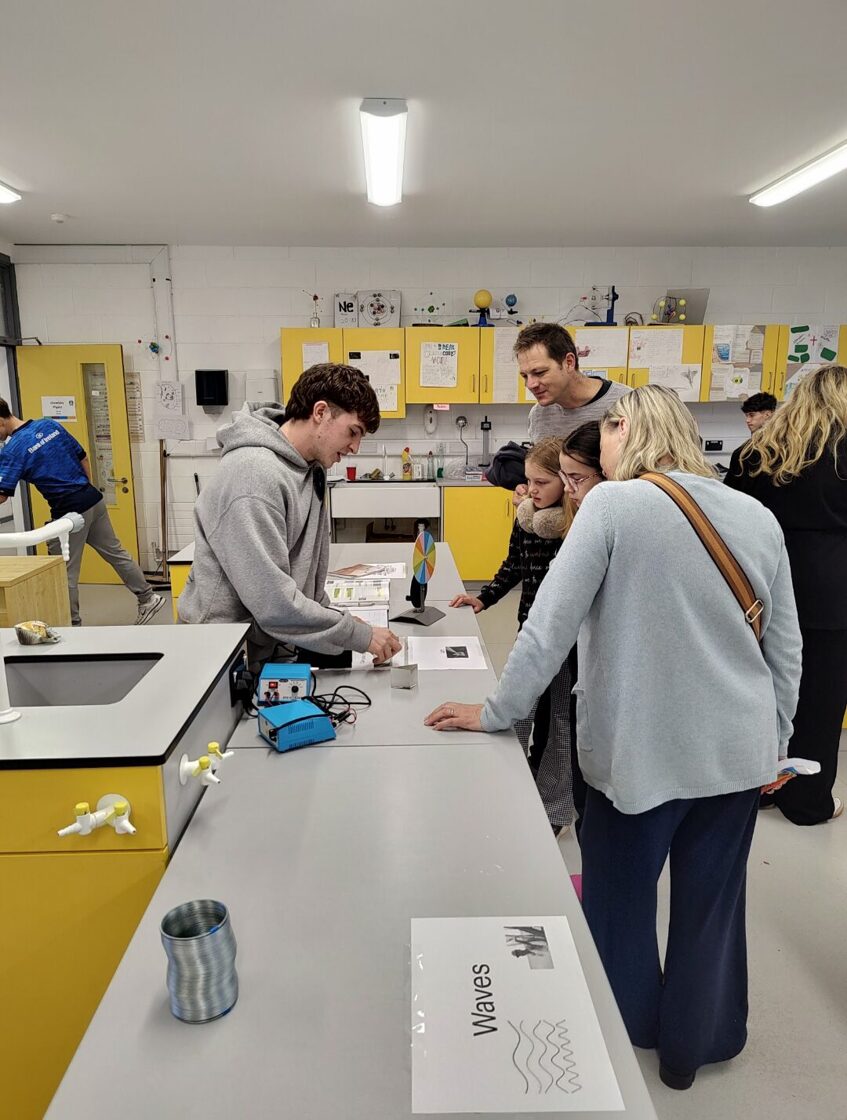 Students working collaboratively in the biology lab